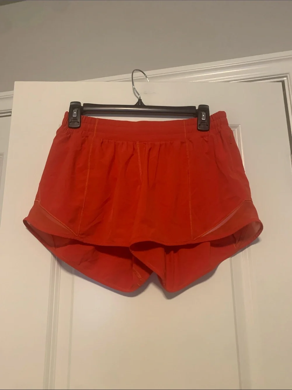 Lululemon Carnation Red Hotty Hot Shorts 4in Sz 8, GUC, 1 pin hole in the back